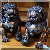 D72. Bronze foo dogs.